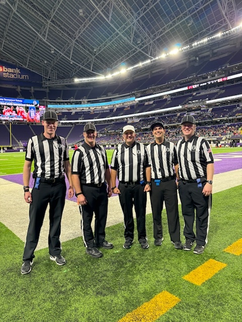 Crew Karnas football officials at the 2024 MSHSL State Tournament